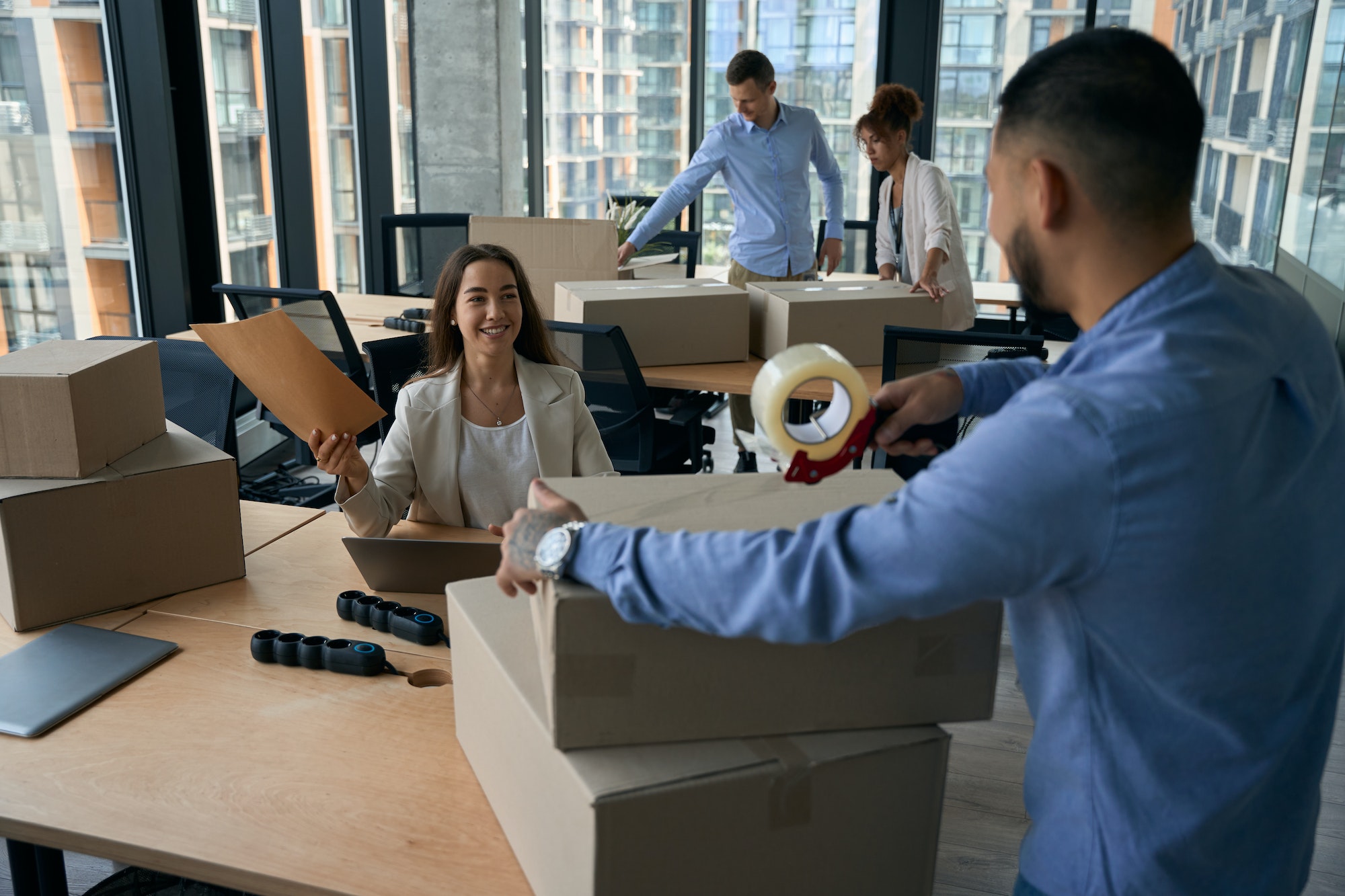 Team of coworkers preparing for office move